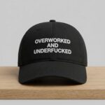 Overworked And Underfucked Hat